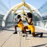 woman in yellow shorts sitting on yellow chair